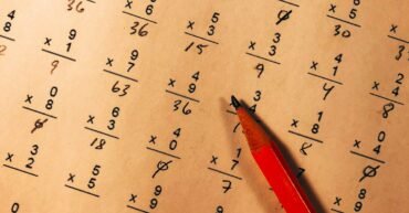 Student preparing for exams with a notebook